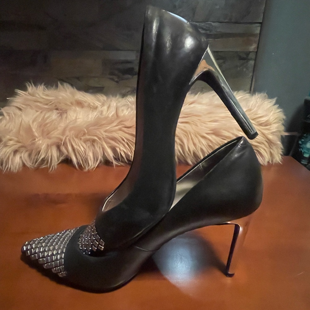 MICHAEL KORS Black leather metal studs cap-toe with 4” metal heel.